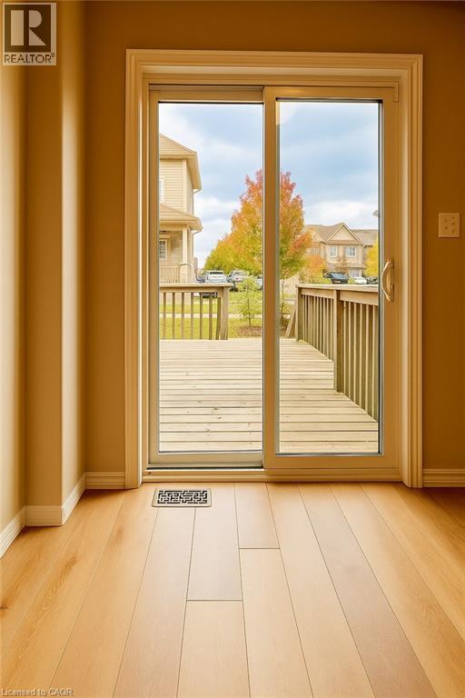 Doorway with wood finished floors - 6 Upper Mercer Street Unit# B6, Kitchener, ON - Indoor Photo Showing Other Room