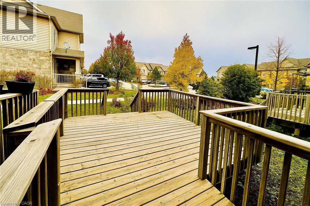 Wooden terrace with a residential view - 6 Upper Mercer Street Unit# B6, Kitchener, ON - Outdoor With Exterior