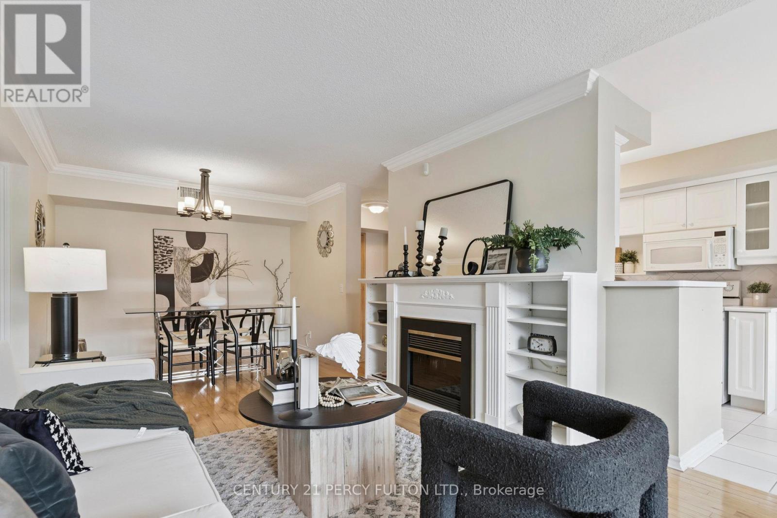 309 - 55 The Boardwalk Way, Markham, ON - Indoor Photo Showing Living Room With Fireplace