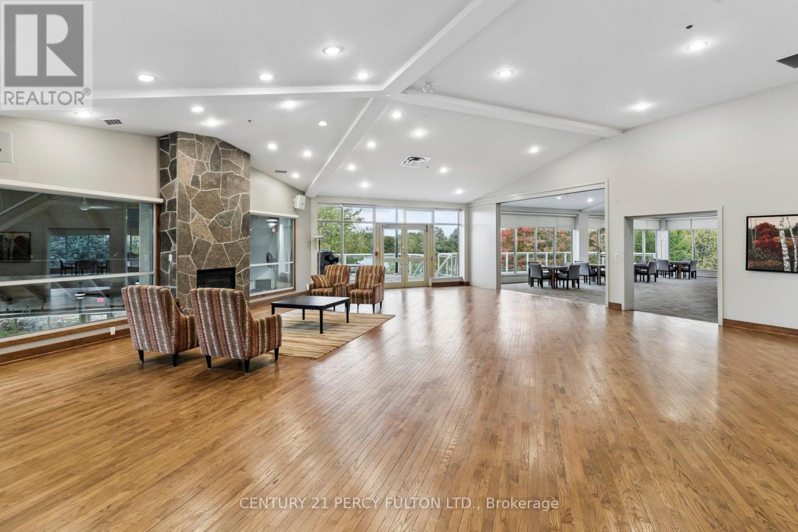 309 - 55 The Boardwalk Way, Markham, ON - Indoor Photo Showing Living Room With Fireplace
