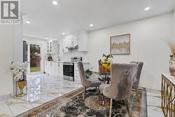 Updated kitchen with stainless appliances. -