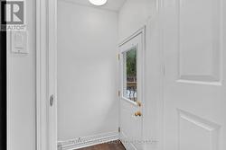 Separate entrance to the lower level in law suite. -