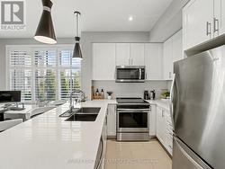 Open Concept Kitchen With Breakfast Bar -