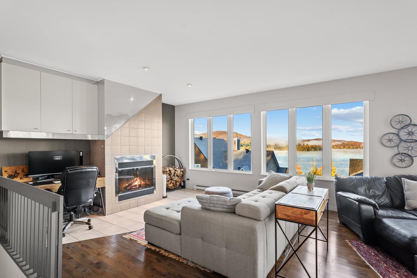 Living room - 10-200 Rue St-Venant, Sainte-Agathe-Des-Monts, QC - Indoor Photo Showing Living Room With Fireplace