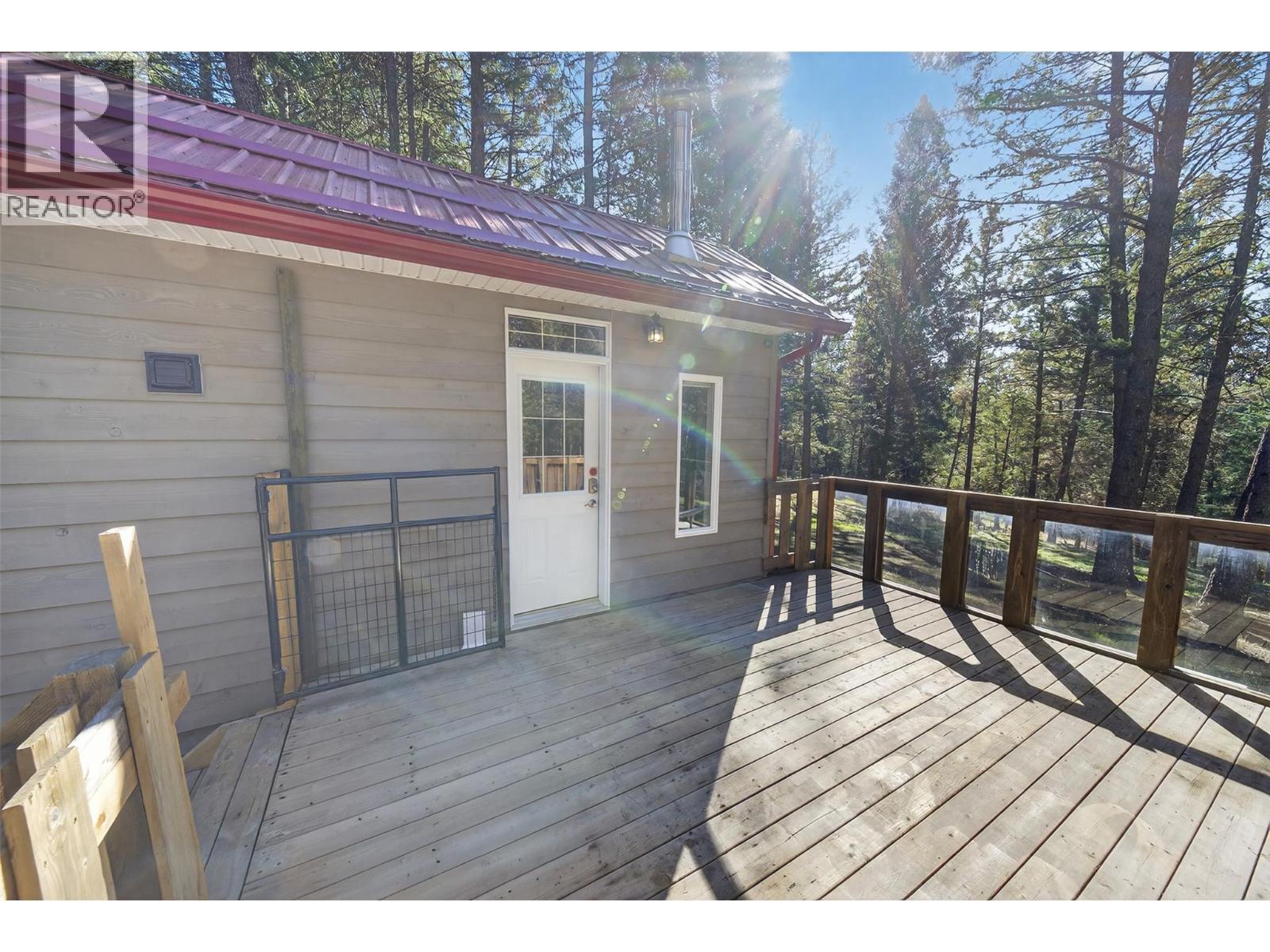 3306 Palmer Road, Baynes Lake, BC - Outdoor With Deck Patio Veranda With Exterior