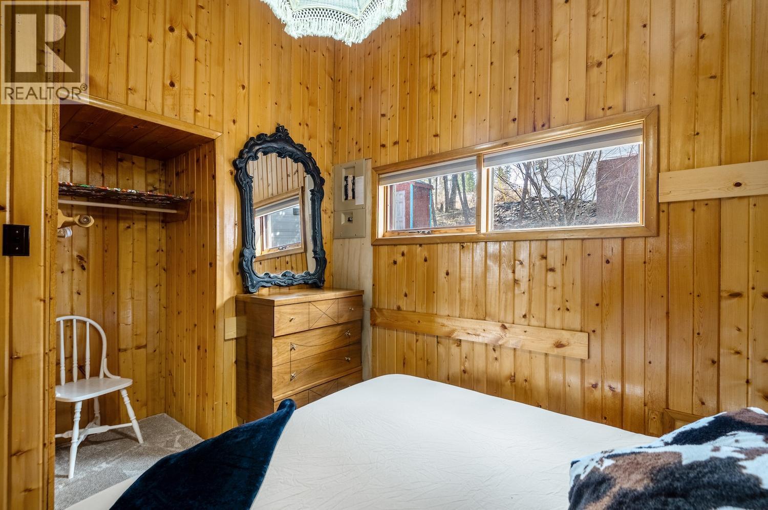 1249 Tie Lake Shore S Road, Jaffray, BC - Indoor Photo Showing Bedroom