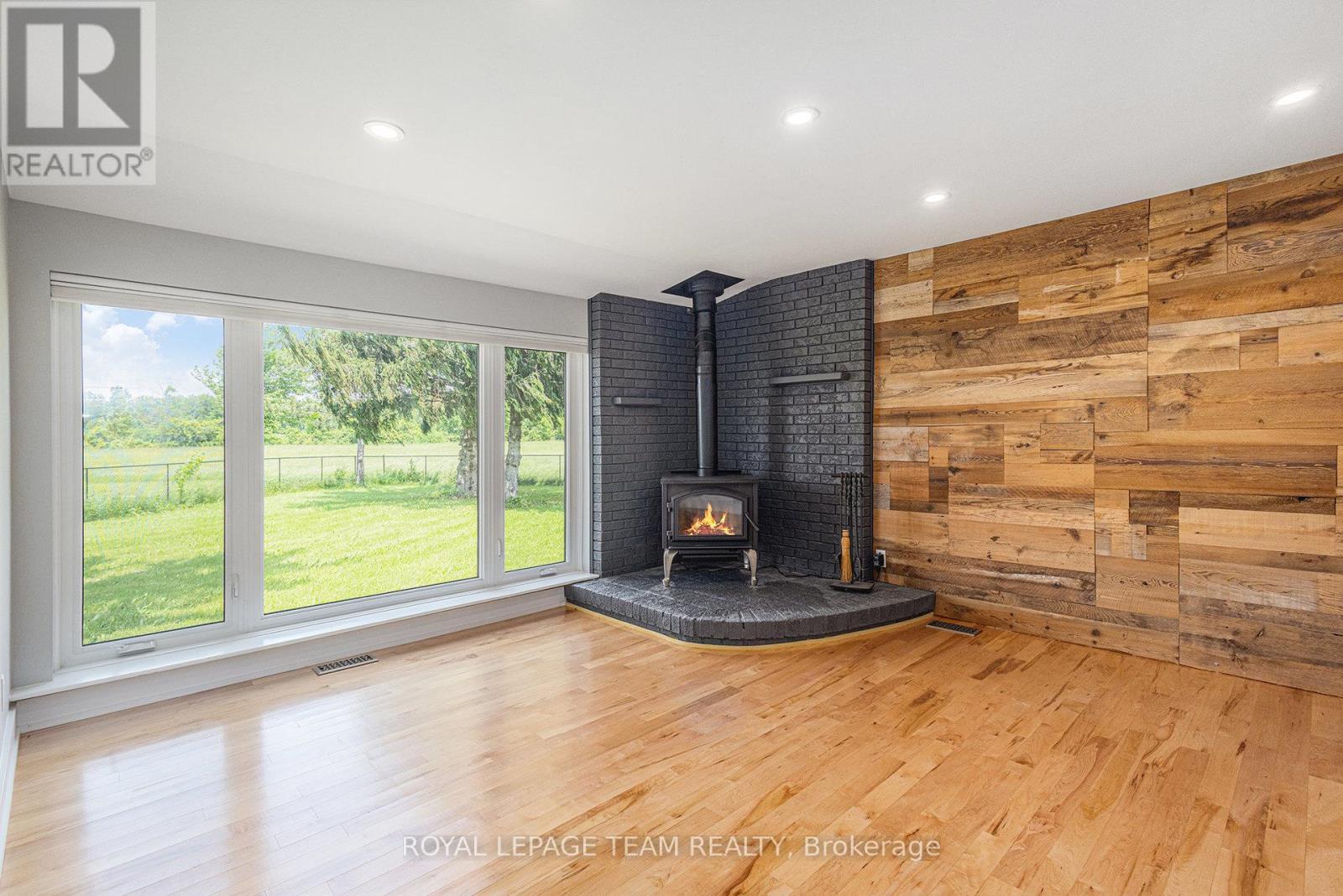3455 Donnelly Drive, Ottawa, ON - Indoor With Fireplace