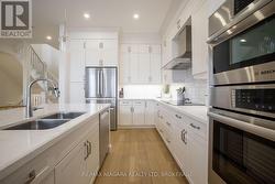 Chefs kitchen with built in appliances -