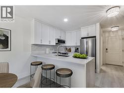 Completely updated throughout including floors, paint, cabinets, countertops & appliances! *virtually staged* -