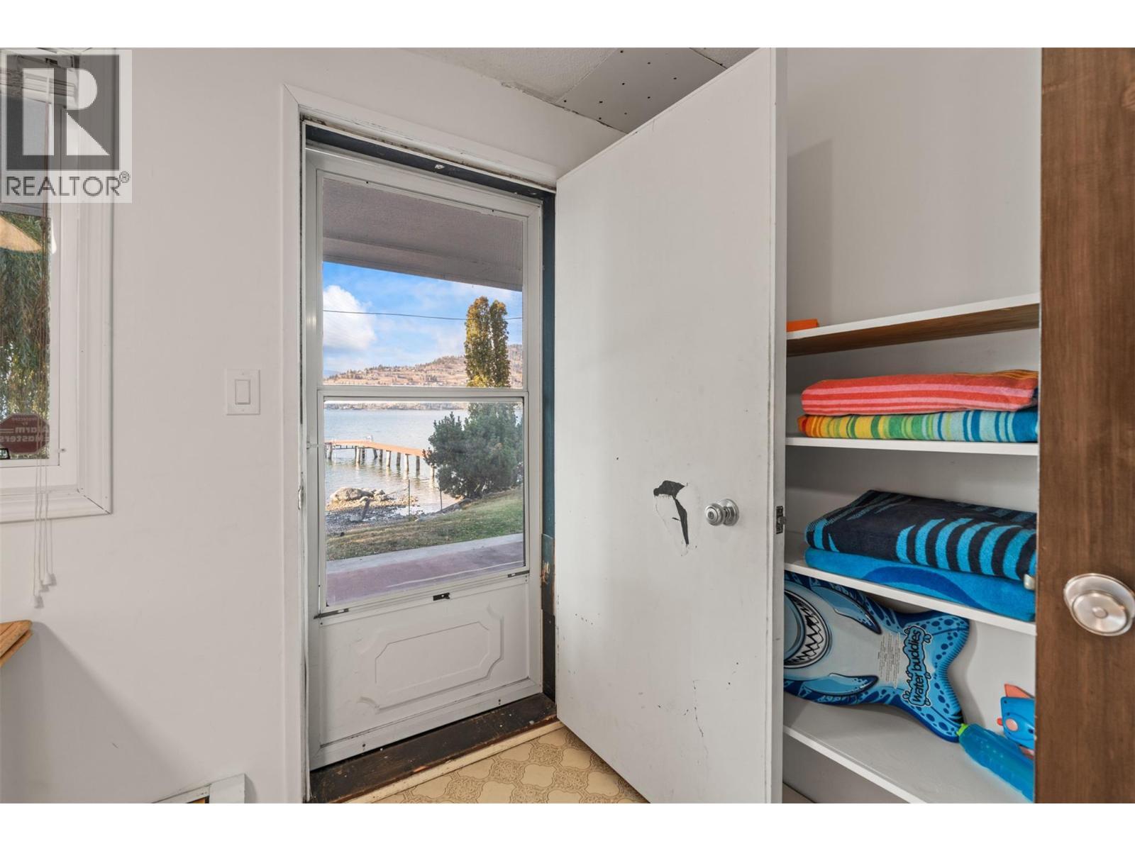 Door From Laundry to Outside Covered Deck - Walk out - 8997 Peters Road, Vernon, BC - Indoor Photo Showing Other Room