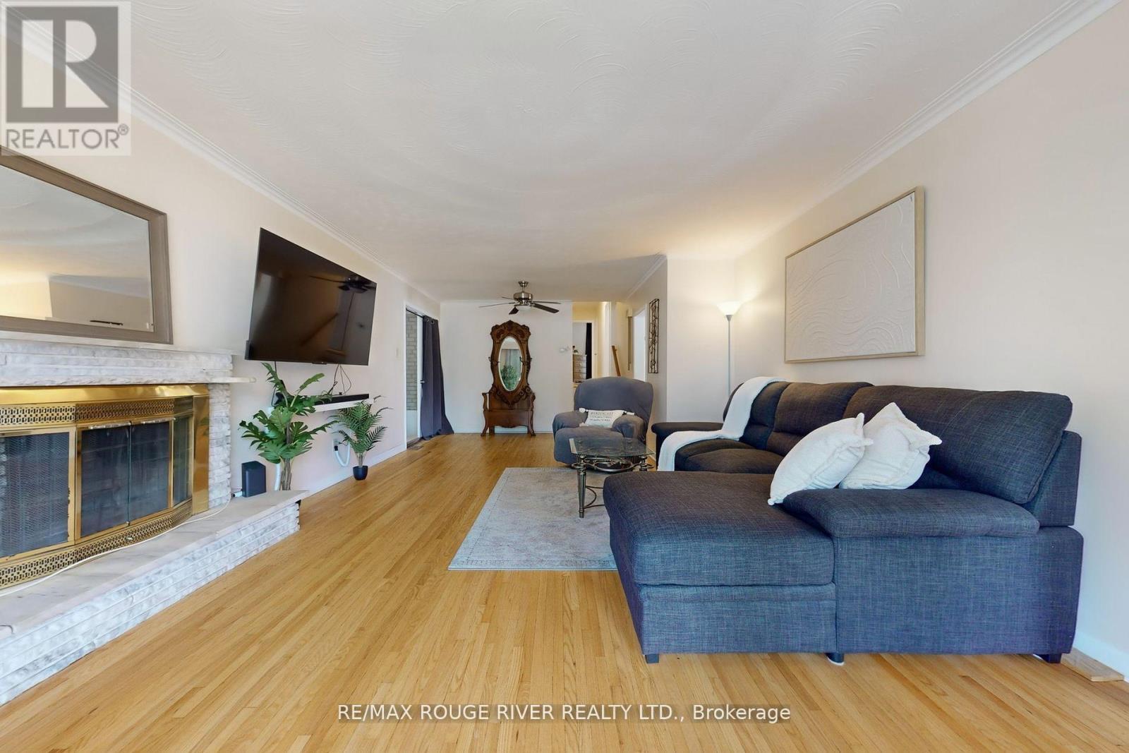18 Darlingside Drive, Toronto, ON - Indoor Photo Showing Living Room With Fireplace