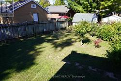 Back Yard View/Partially Fenced in Yard -