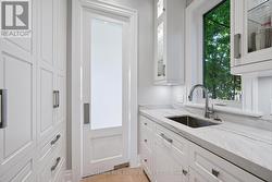 Concealed Prep Kitchen with Swing Door -