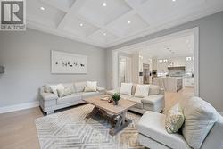 Family Room with Waffle Ceiling is Open to Kitchen -