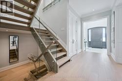 White Oak Floating Stairs with Pin Lighting -