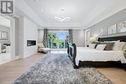 Luxurious Primary Suite Offers a 2-Sided Fireplace -