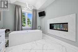 Primary Ensuite Features a Freestanding Air Tub -