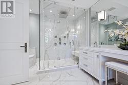 Glass Shower with Rain Head & Body Jets in Ensuite -