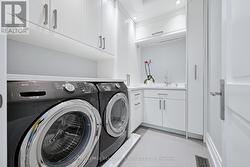Convenient Laundry Room on the Upper Level -