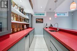 Vibrant Red Quartz Wet Bar -