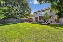 Beautifully Landscaped and Fully Fenced Backyard -
