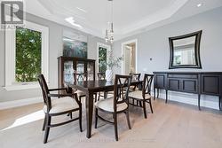 Formal Dining Room with an Elegant Ceiling Design -