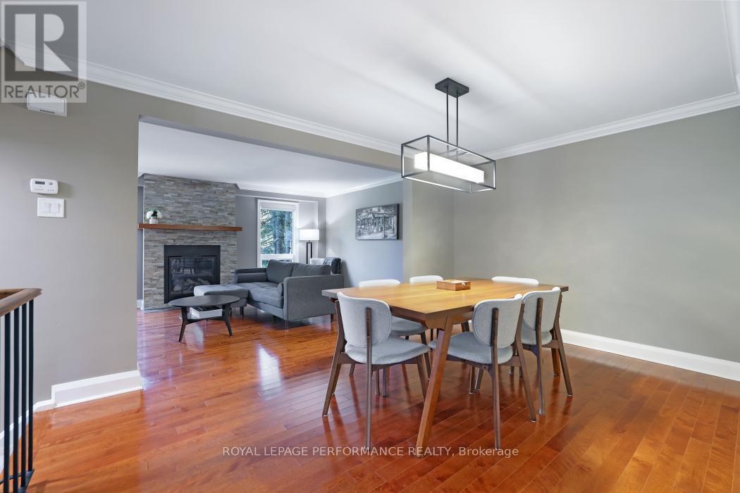 21 Arbordale Crescent, Ottawa, ON - Indoor Photo Showing Dining Room With Fireplace