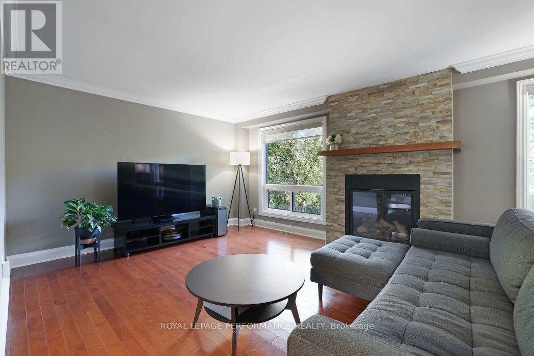 21 Arbordale Crescent, Ottawa, ON - Indoor Photo Showing Living Room With Fireplace