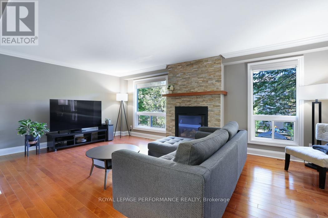 21 Arbordale Crescent, Ottawa, ON - Indoor Photo Showing Living Room With Fireplace
