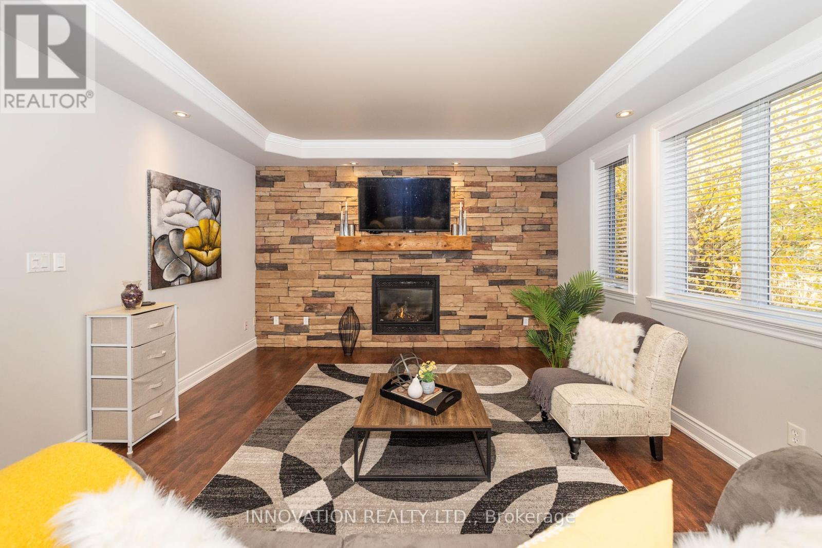 122 Country Meadow Drive S, Ottawa, ON - Indoor Photo Showing Living Room With Fireplace