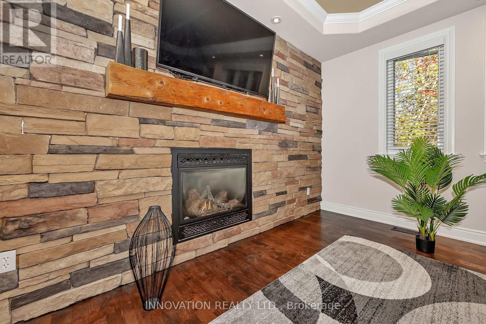 122 Country Meadow Drive S, Ottawa, ON - Indoor Photo Showing Living Room With Fireplace