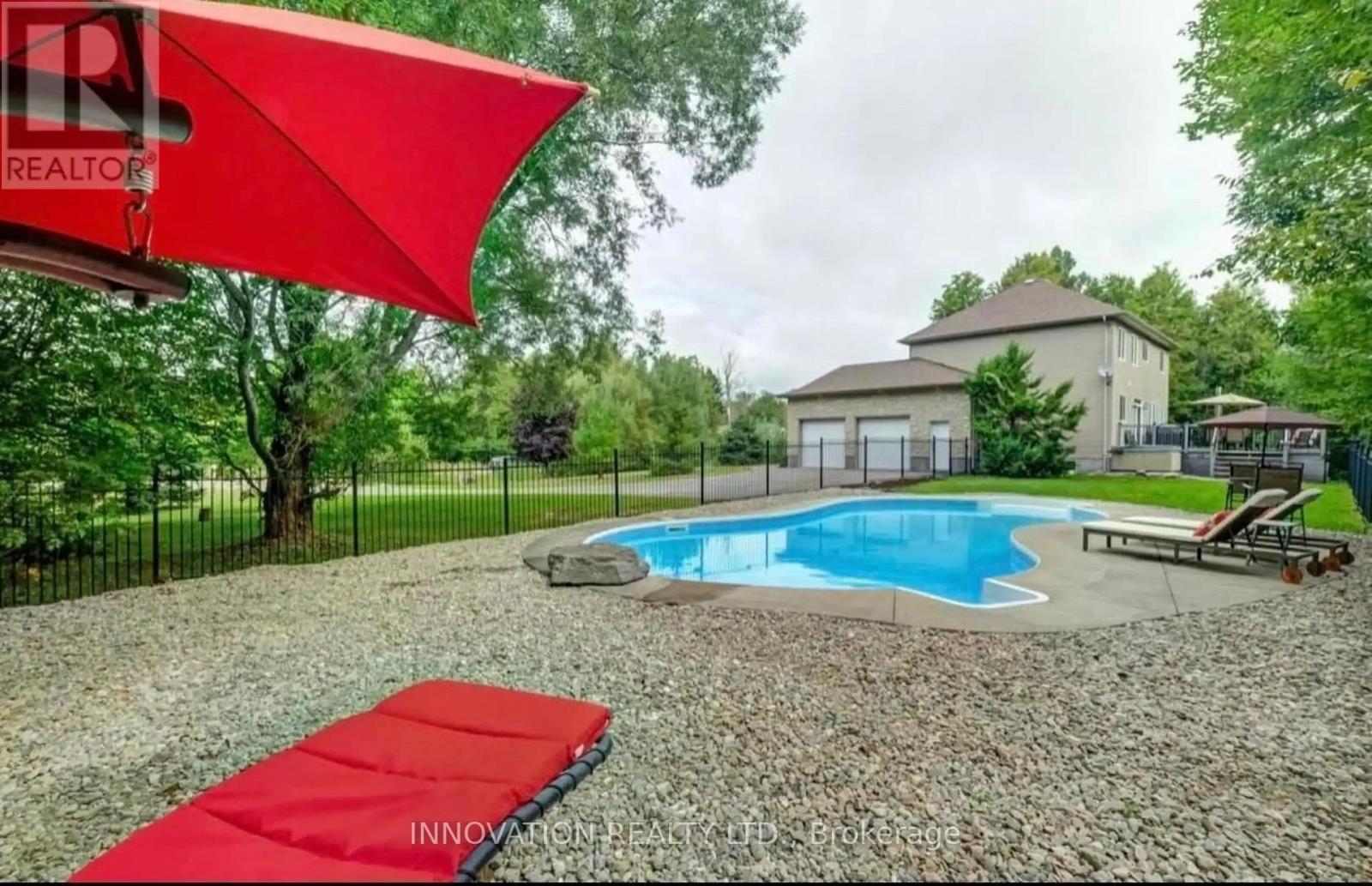 122 Country Meadow Drive S, Ottawa, ON - Outdoor With In Ground Pool With Backyard