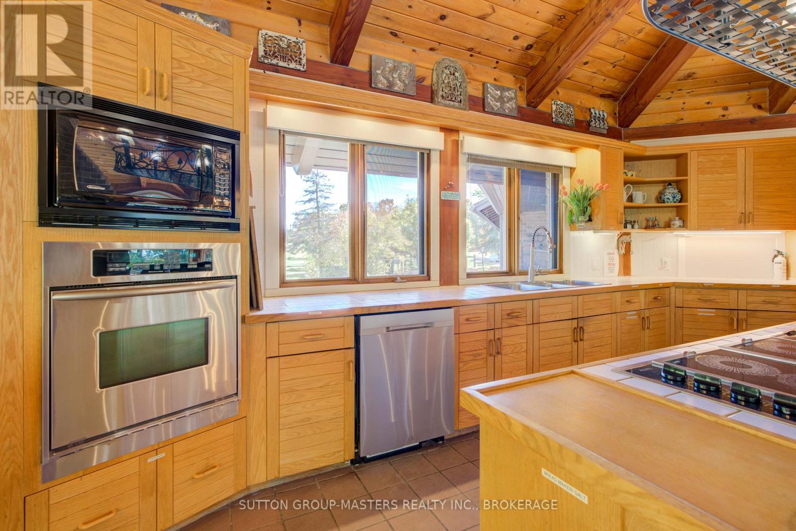 314 Baseline Road, Frontenac Islands (The Islands), ON - Indoor Photo Showing Kitchen With Double Sink