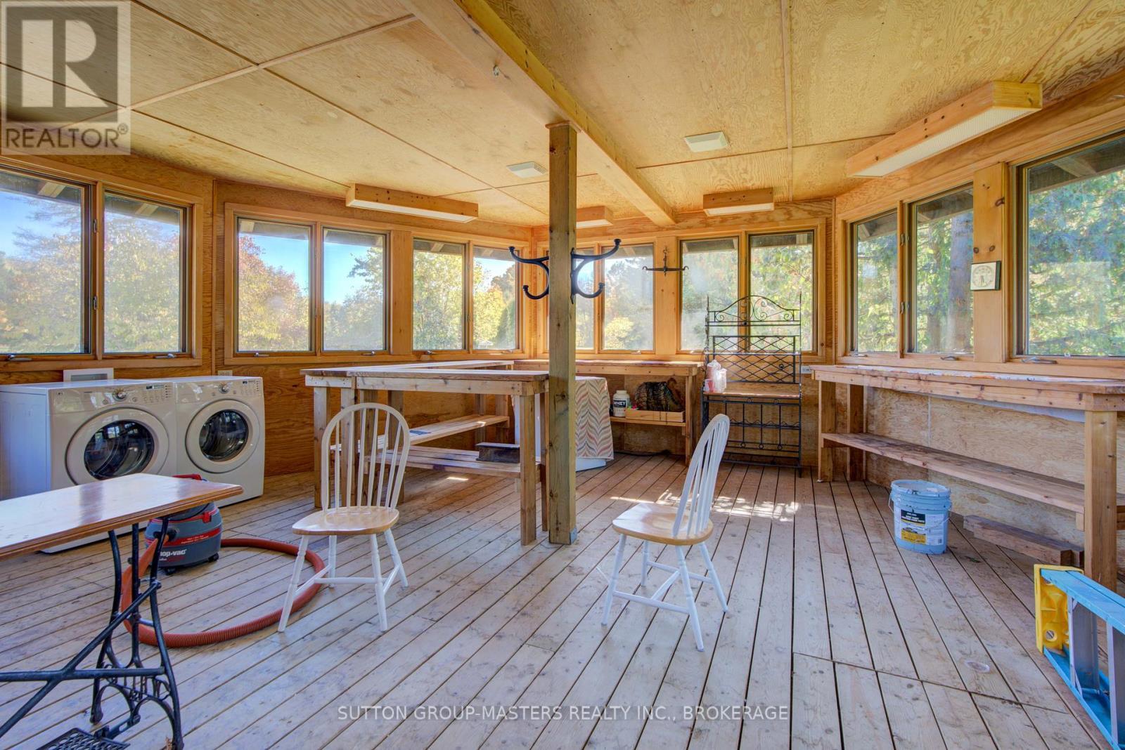 3 season room off garage with sink/extra laundry - 314 Baseline Road, Frontenac Islands (The Islands), ON - Photo Showing Other Room
