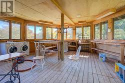 3 season room off garage with sink/extra laundry -