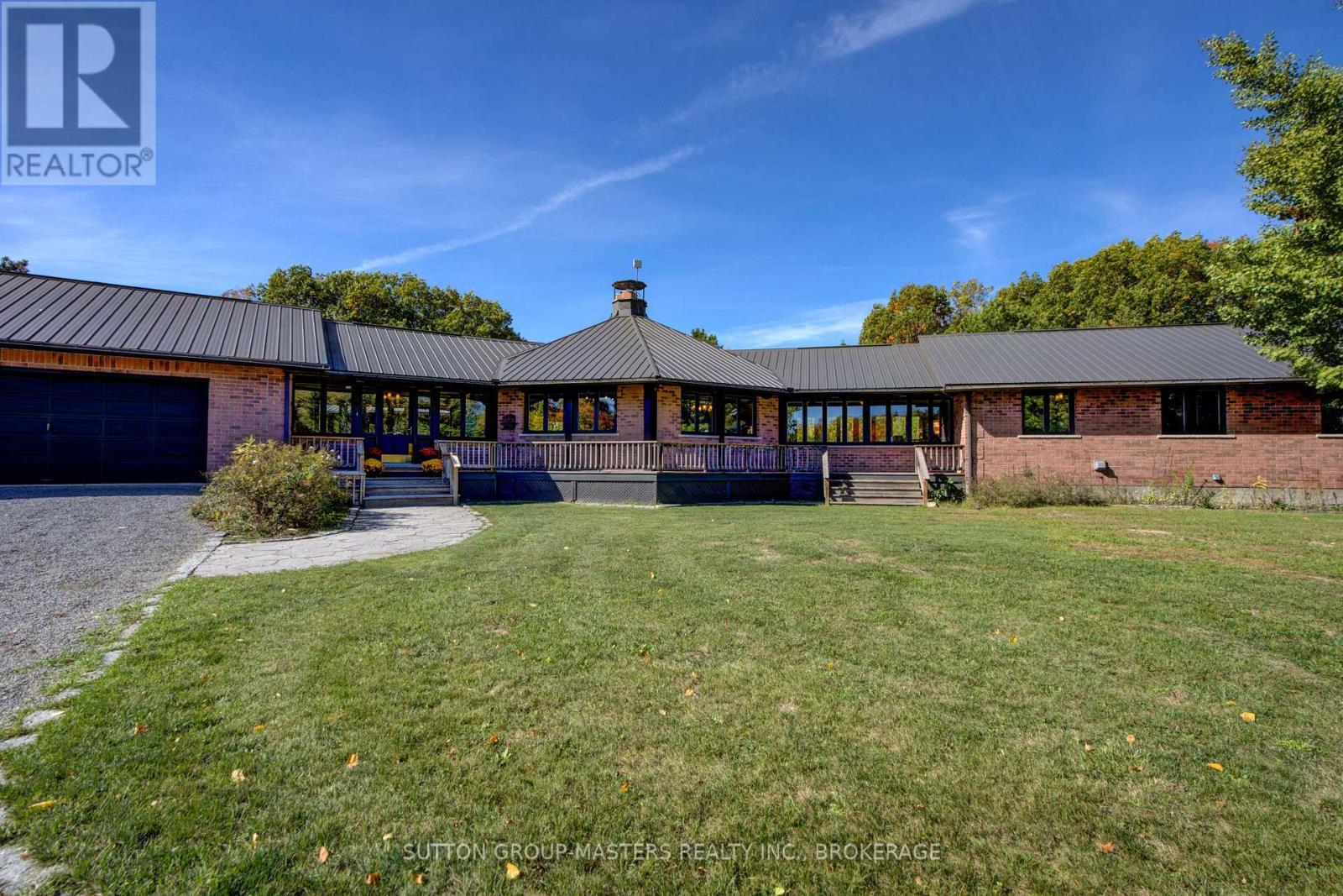 314 Baseline Road, Frontenac Islands (The Islands), ON - Outdoor With Deck Patio Veranda