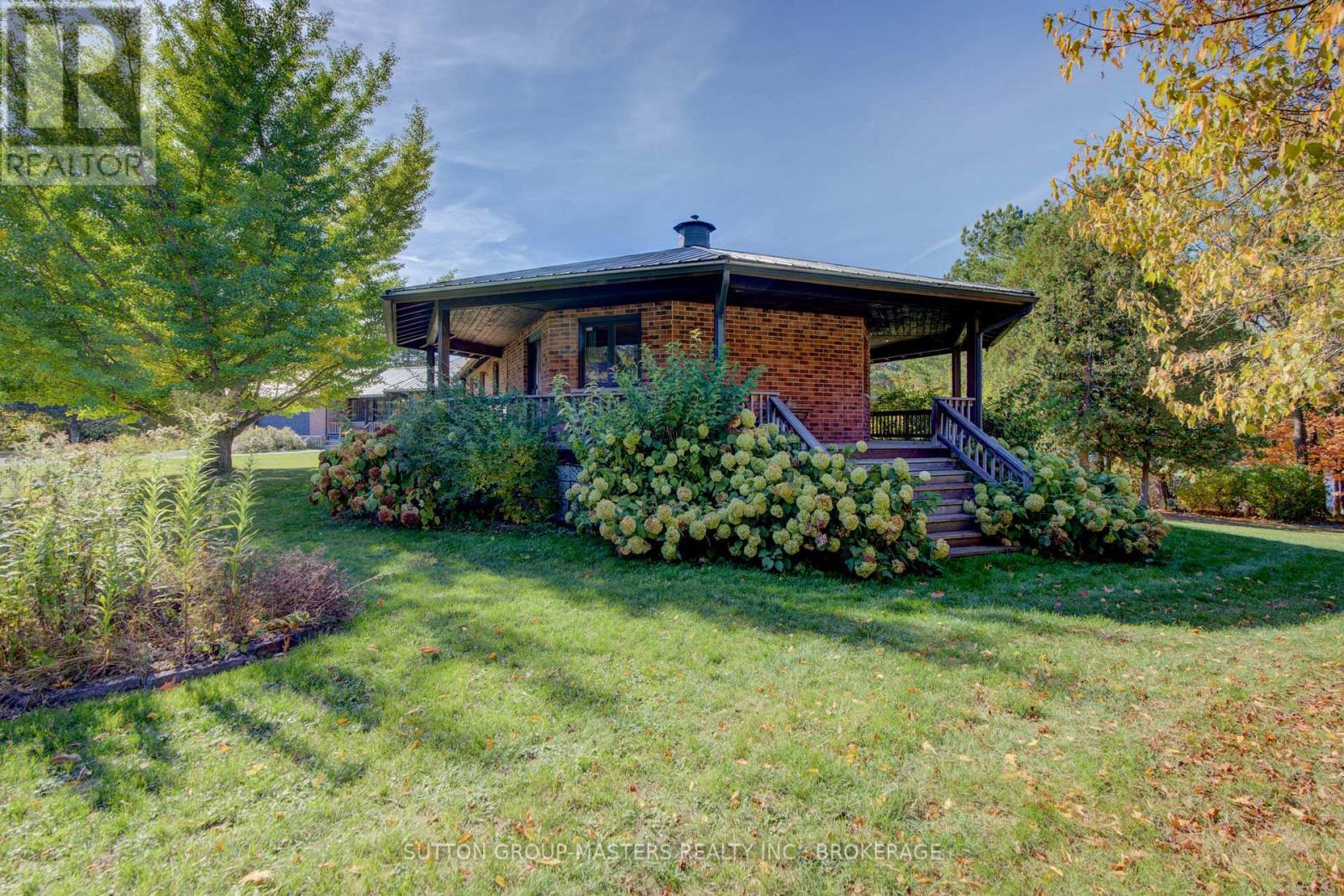 wraparound deck off primary BR - 314 Baseline Road, Frontenac Islands (The Islands), ON - Outdoor