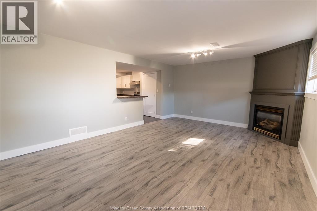 3134 Riberdy Unit# Lower, Windsor, ON - Indoor Photo Showing Other Room With Fireplace