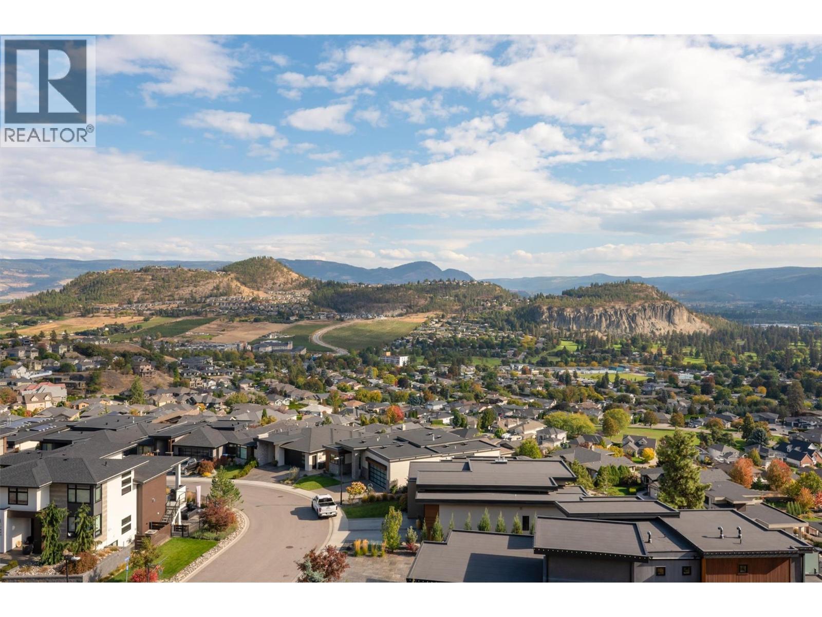 Breathtaking views of the city, mountains, and valley. - 738 Highpointe Drive, Kelowna, BC - Outdoor With View