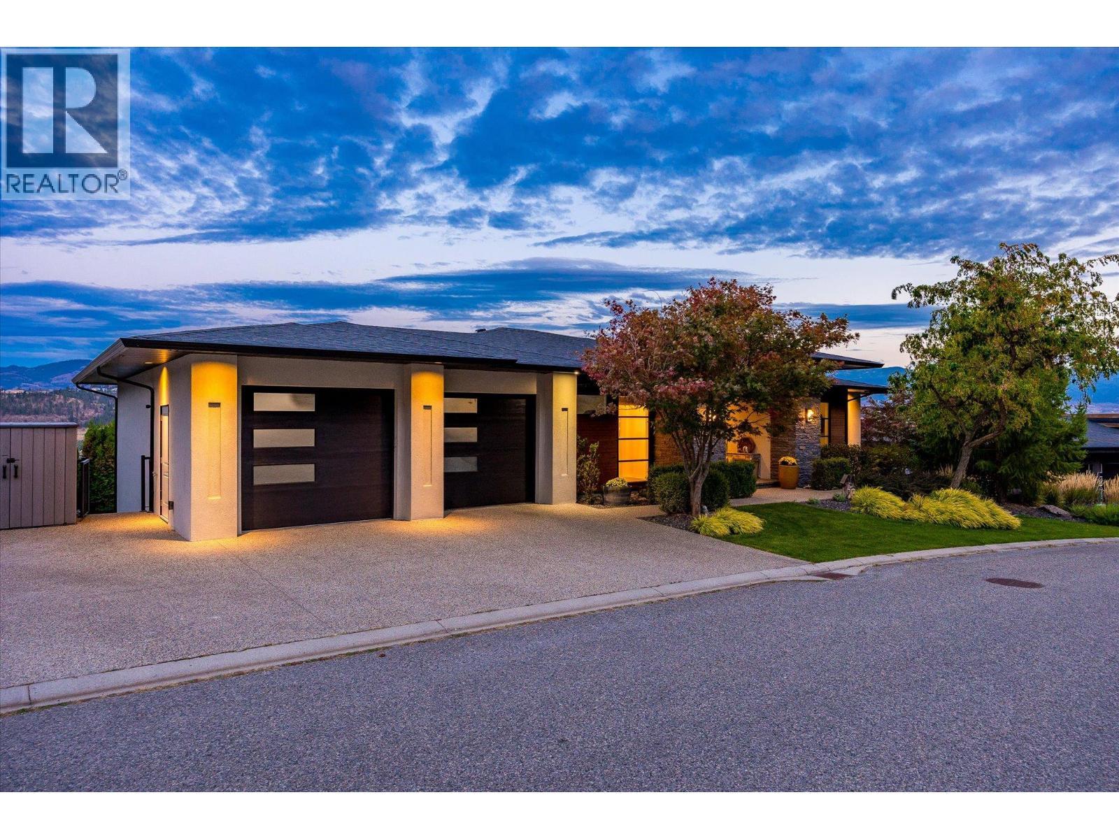 Plenty of parking in double garage and open driveway parking. Enough Space for an RV or Boat! - 738 Highpointe Drive, Kelowna, BC - Outdoor