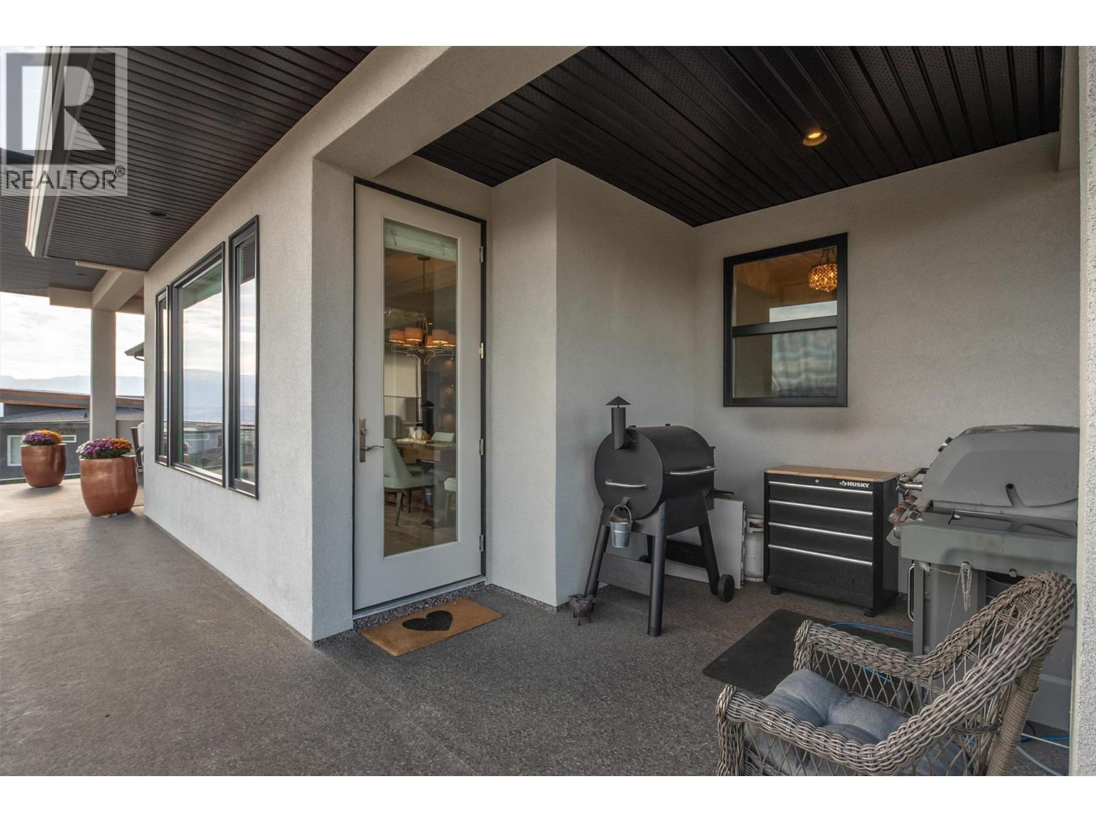 Complete with a gas BBQ hook up - 738 Highpointe Drive, Kelowna, BC - Outdoor With Deck Patio Veranda With Exterior