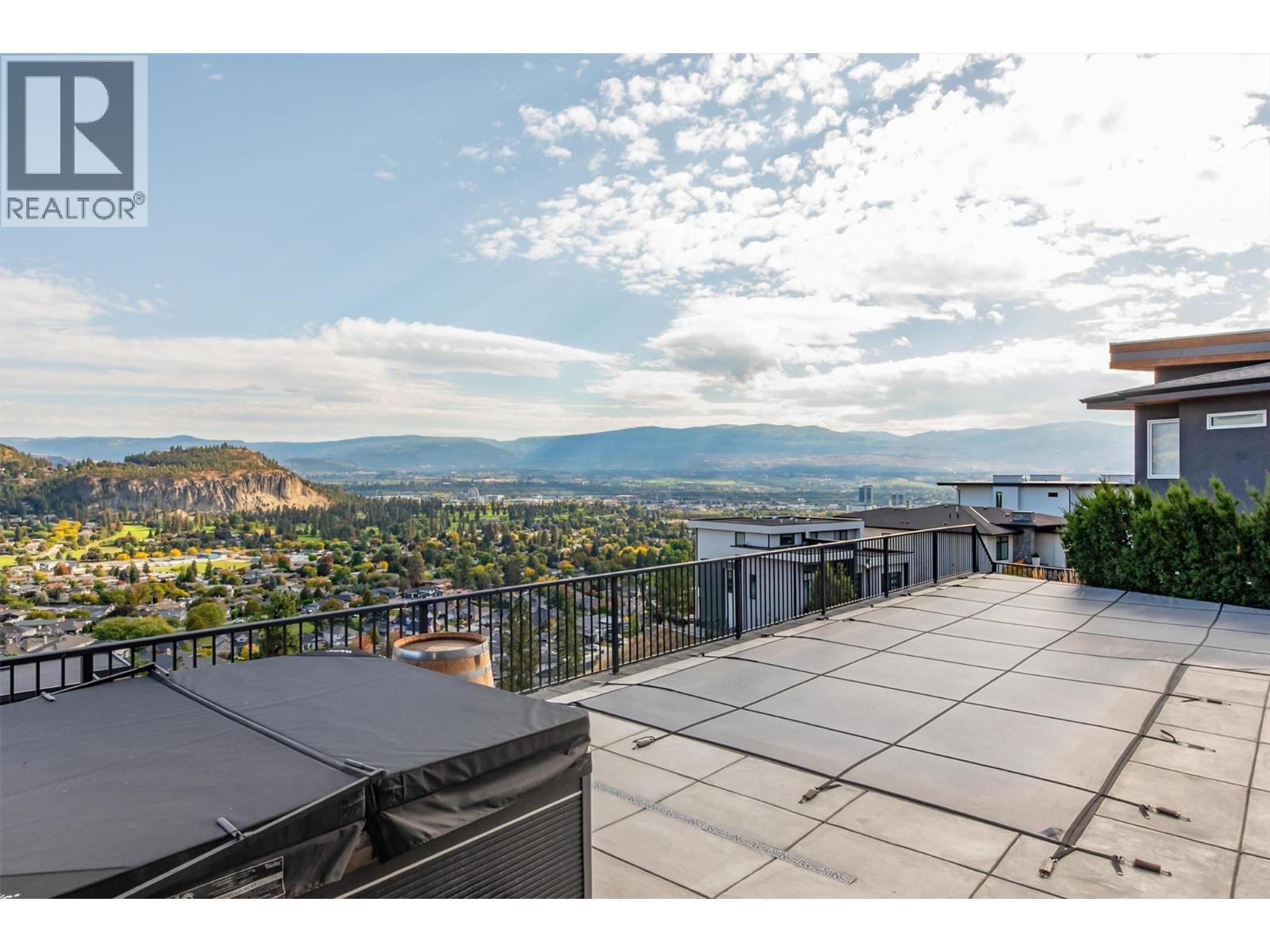 WELLIS hot tub with a breathtaking view - 738 Highpointe Drive, Kelowna, BC - Outdoor With View