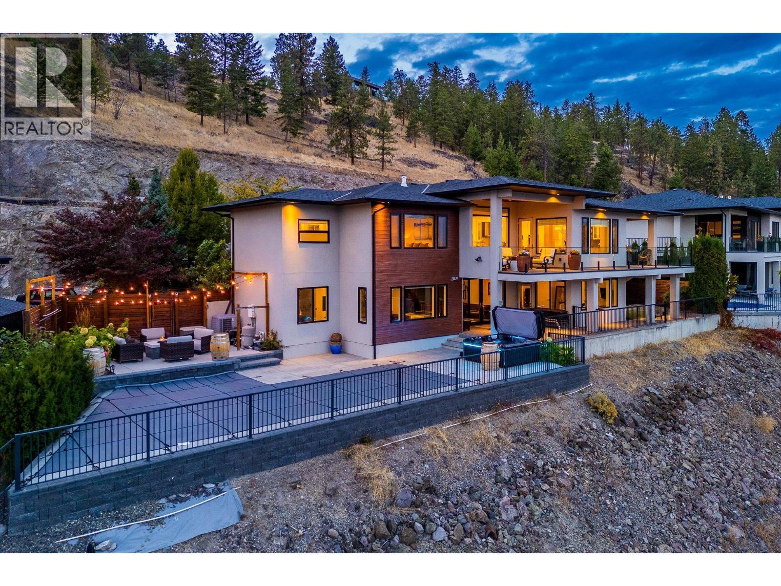 Fully fenced in backyard - 738 Highpointe Drive, Kelowna, BC - Outdoor With Deck Patio Veranda