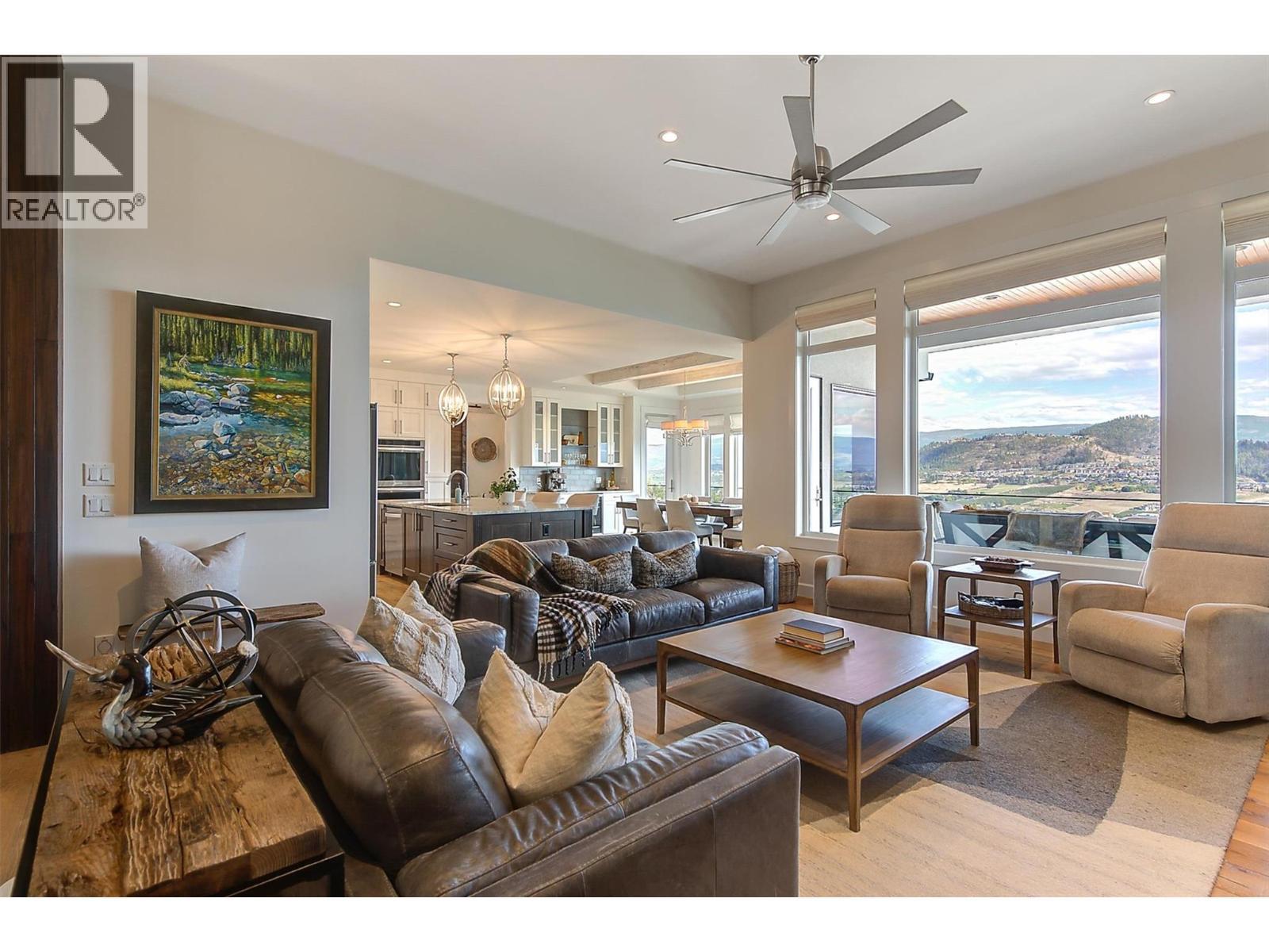 Great room opens to the kitchen - 738 Highpointe Drive, Kelowna, BC - Indoor Photo Showing Living Room
