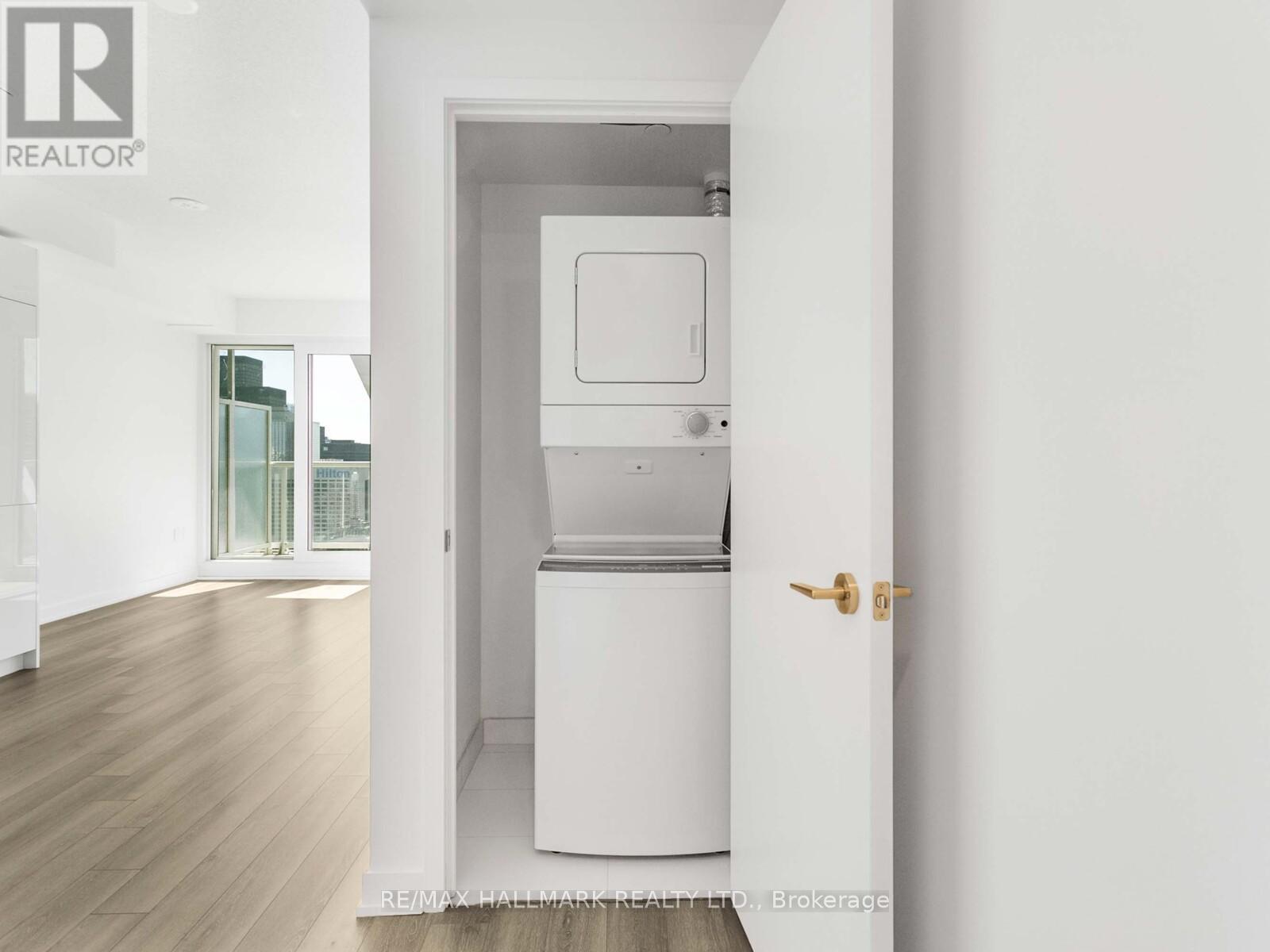 3217 - 230 Simcoe Street, Toronto, ON - Indoor Photo Showing Laundry Room