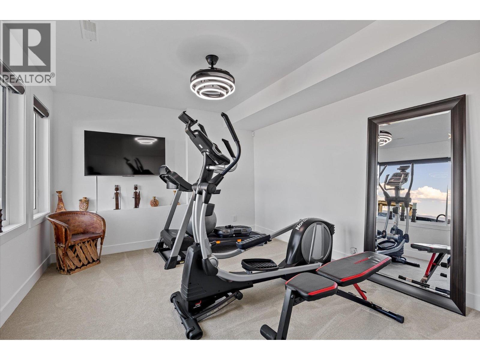 750 Kuipers Crescent, Kelowna, BC - Indoor Photo Showing Gym Room