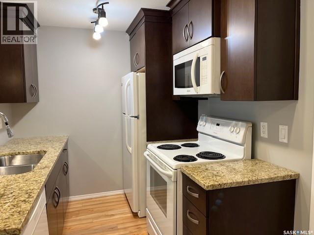 109 1220 Blackfoot Drive, Regina, SK - Indoor Photo Showing Kitchen With Double Sink