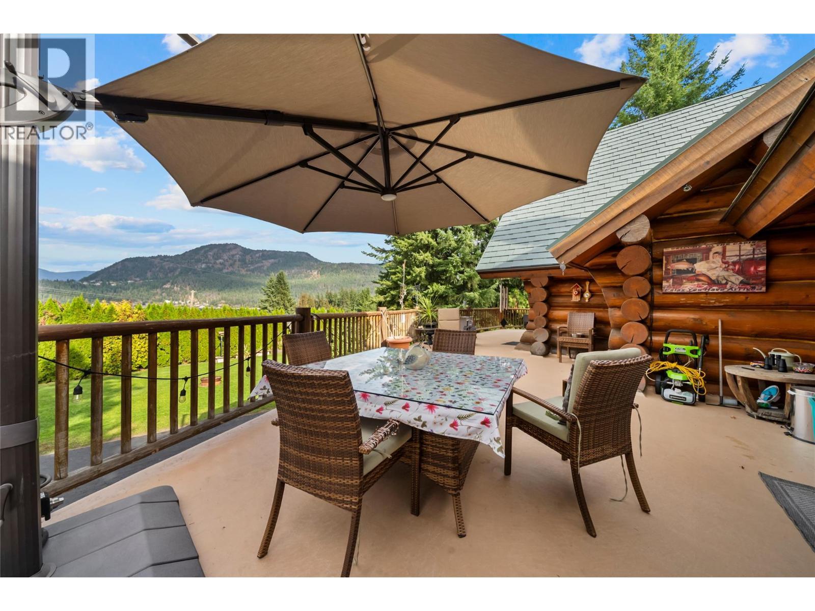 Dinning area on deck - 2462 Leisure Road, Blind Bay, BC - Outdoor With Deck Patio Veranda With Exterior