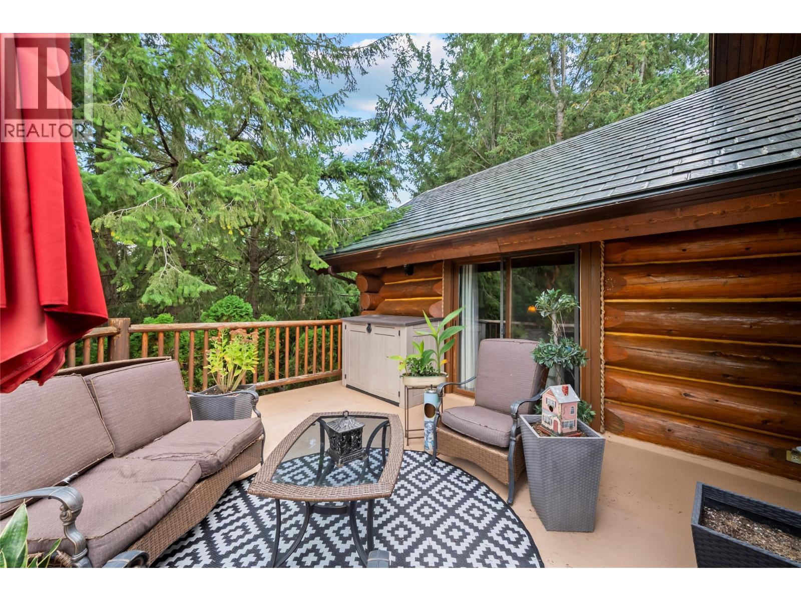 Private sitting area on deck, off primary bedroom - 2462 Leisure Road, Blind Bay, BC - Outdoor With Deck Patio Veranda With Exterior