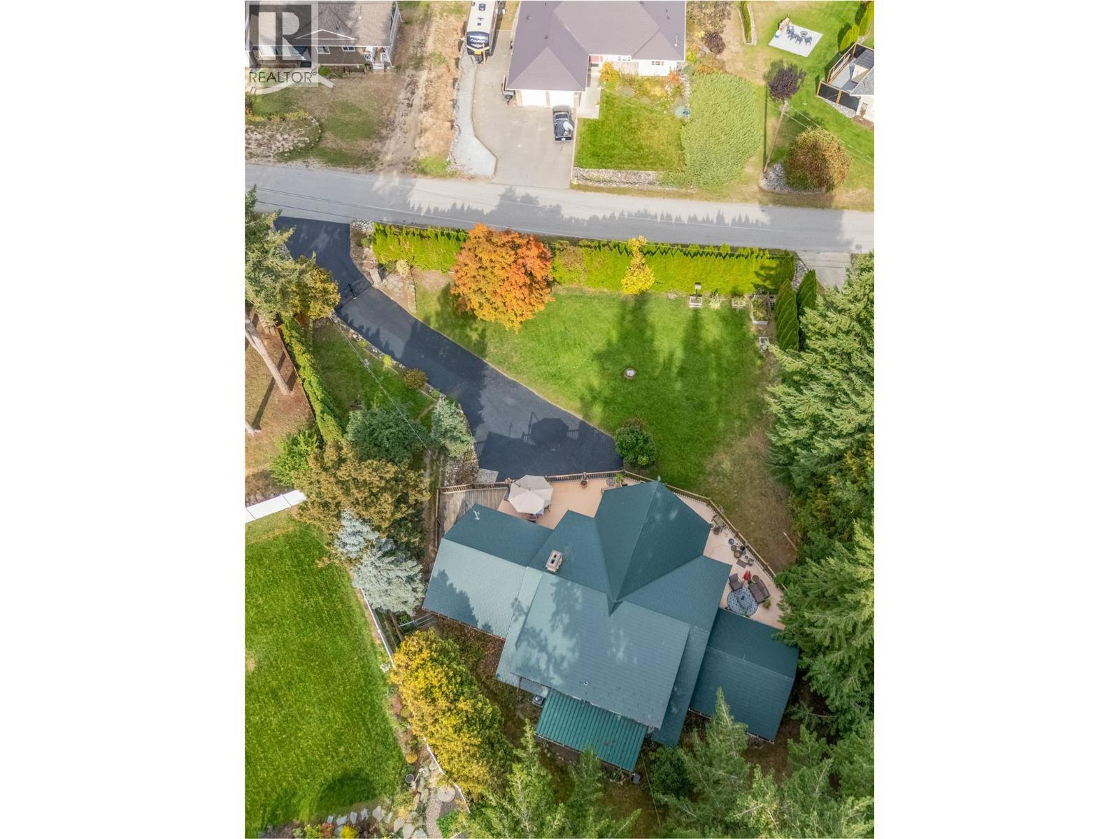 Aerial view of home and large fully fenced lot - 2462 Leisure Road, Blind Bay, BC - Outdoor With View